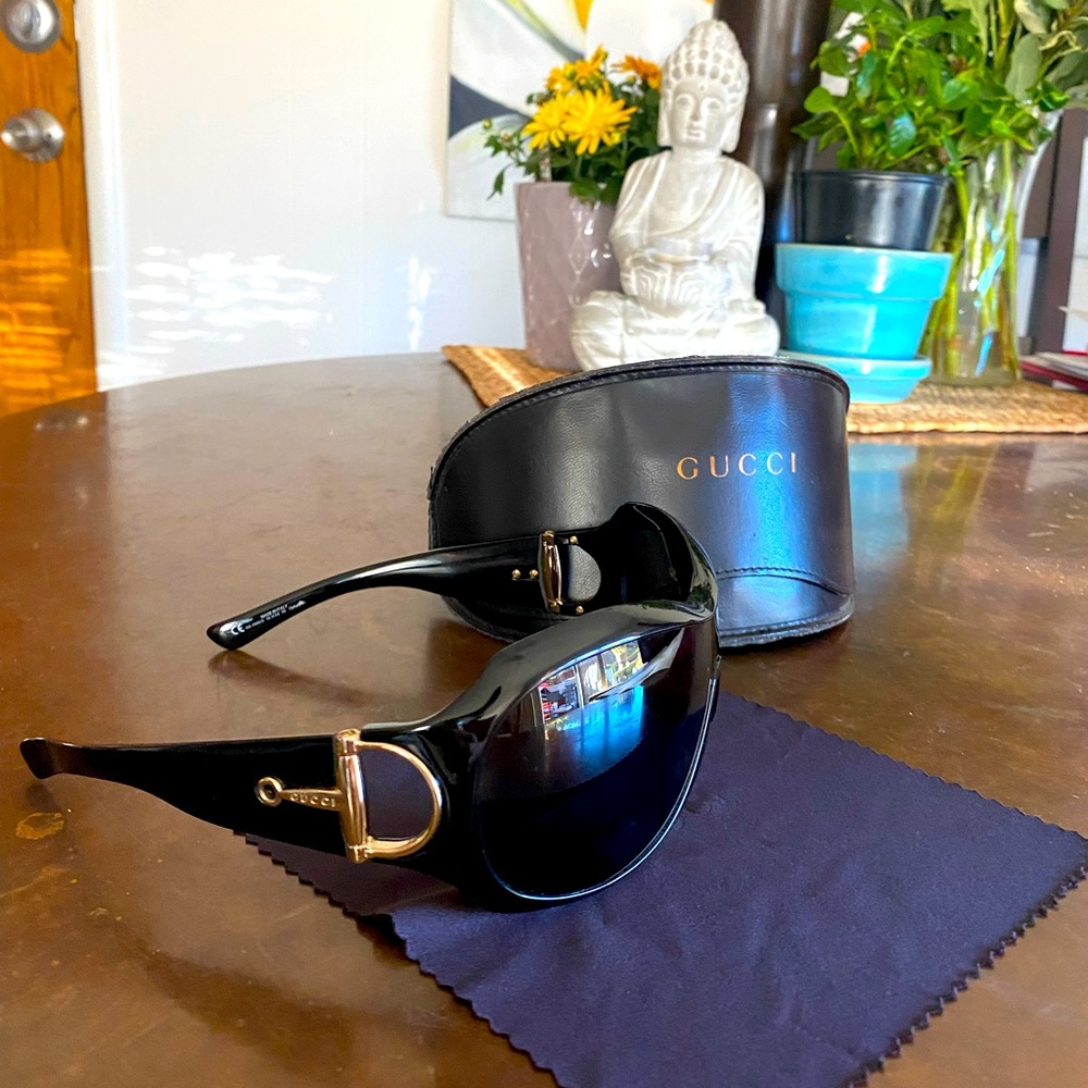Black Gucci wrap sunglasses never worn